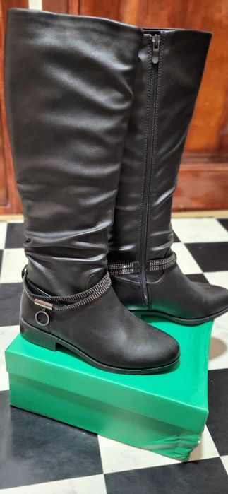 Продам новые сапоги