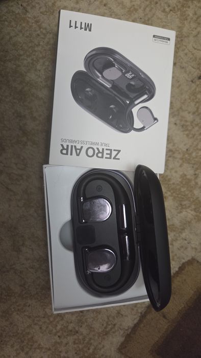 Casti bluetooth cu traducere A.I. in 144 de limbi