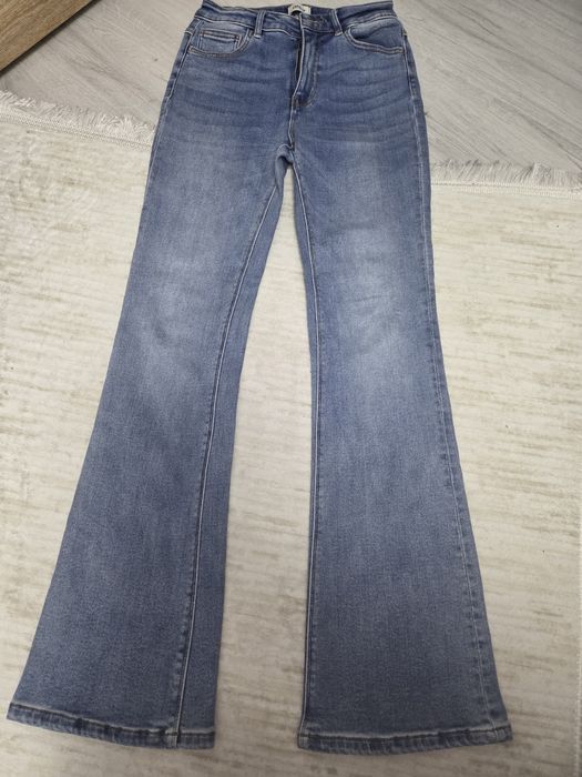 Blugi damă evazați