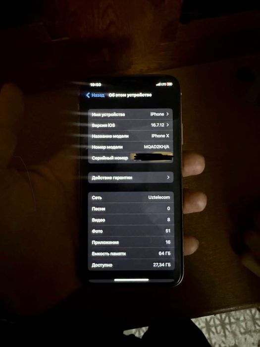 Iphone x telefoni xotirasi 64 talik rangi oq batareka uselenya qoyilga