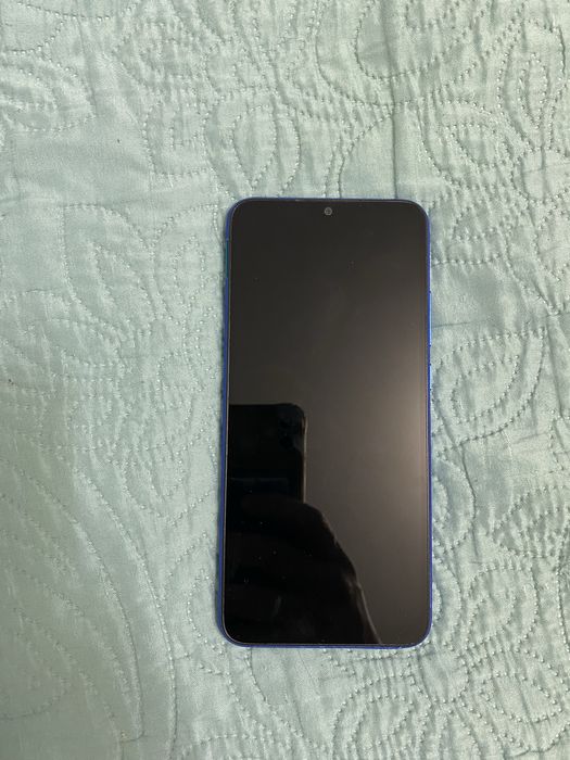 Телефон редми 9А .