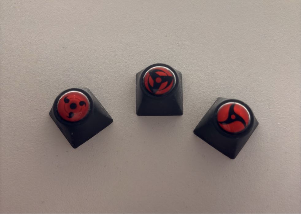 Set 3 keycaps custom – model Sharingan (inspirat din Naruto)