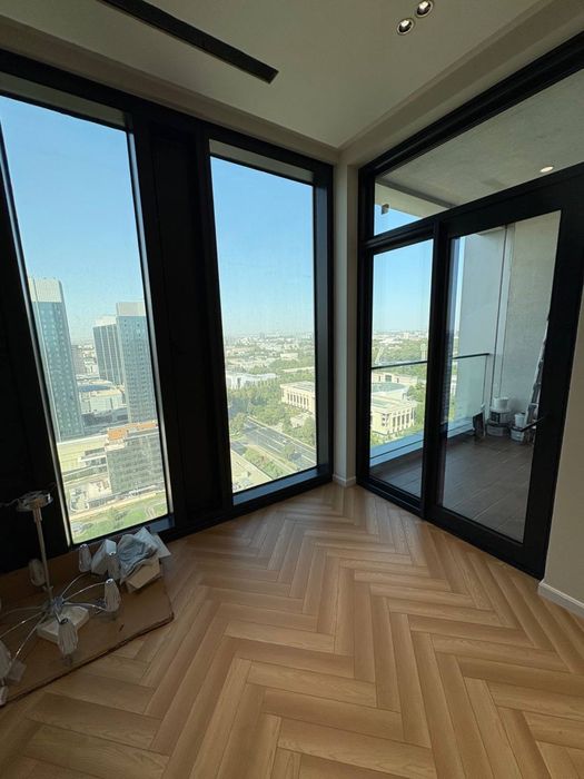 NestOne квартира 23 этаж 59м Блок А. Балкон в Ташсити парк смотрит