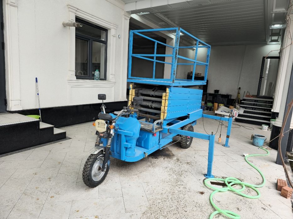 9 m elektr uch g'ildirakli velosiped qaychi ko'taruvchi