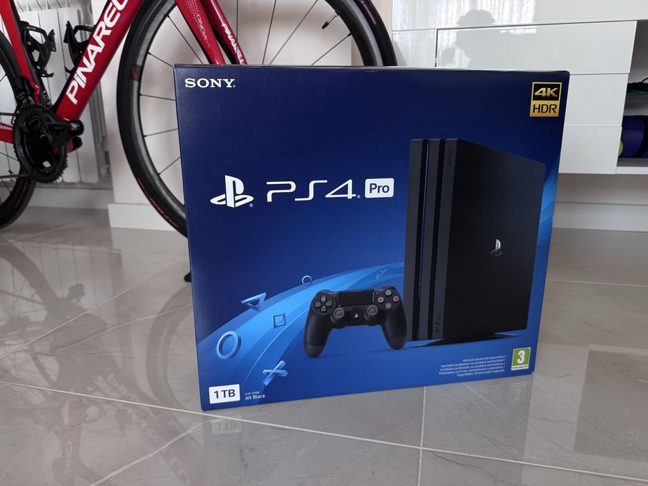 Playstation 4 Pro 1 TB SSD - пълен комплект + 9 игри