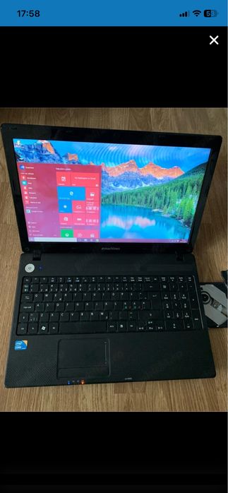 Laptop Emachines intel core i3 Display 15,6 led,4gb ram ddr3,320gb memorie,Windows 10 Pro perfect functional cu incarcator