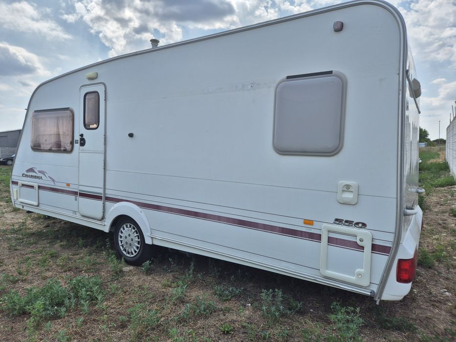 Rulota Swift Carisma 2006 4/5 locuri