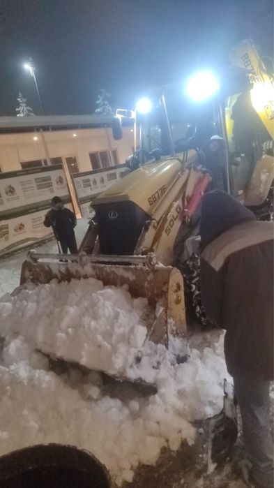 Вывоз снега, погрузка. Трактор, Howo