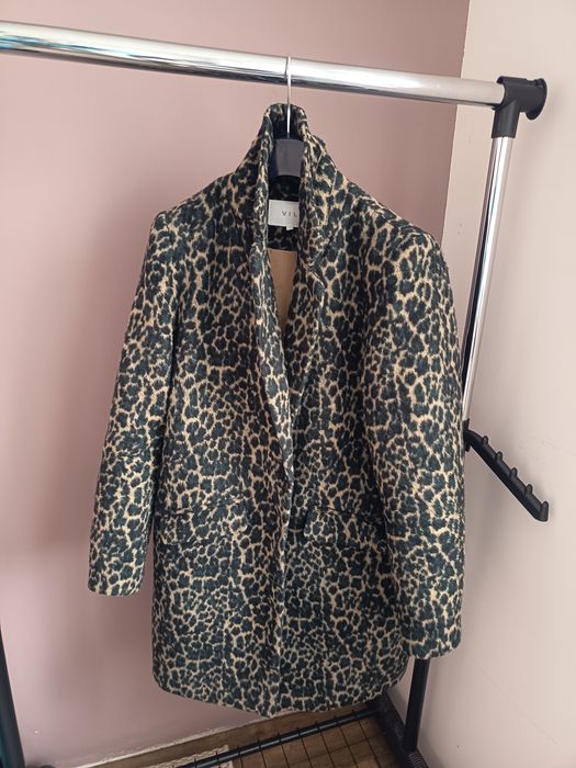 Преходно леопардово палто