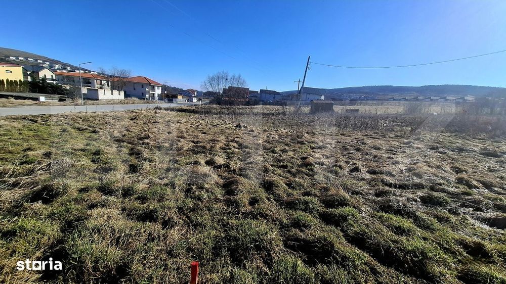 Teren construibil -556 mp situat in Chinteni in  zona de case, front 1