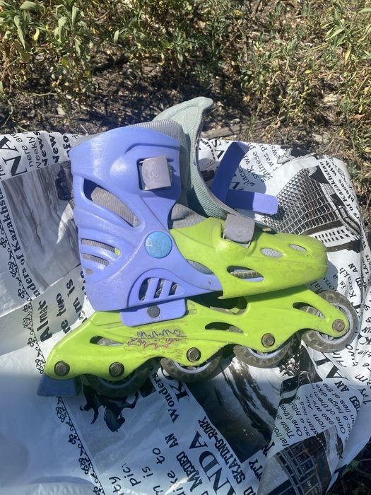 Роликовые коньки