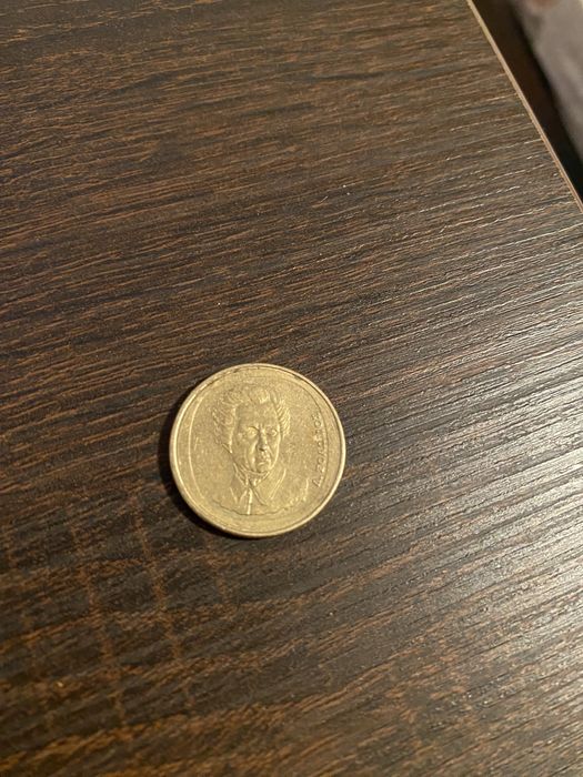 Vând moneda 20 drahme , an 1990 .