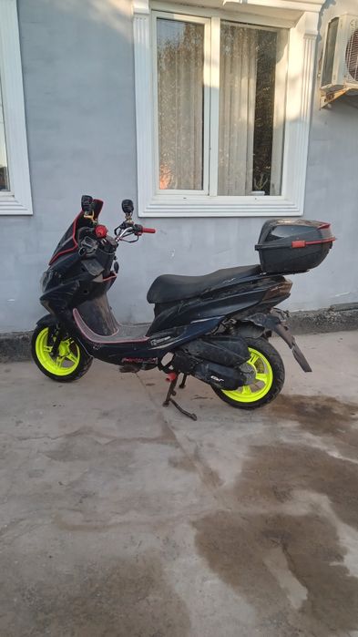 Скутер макси рест