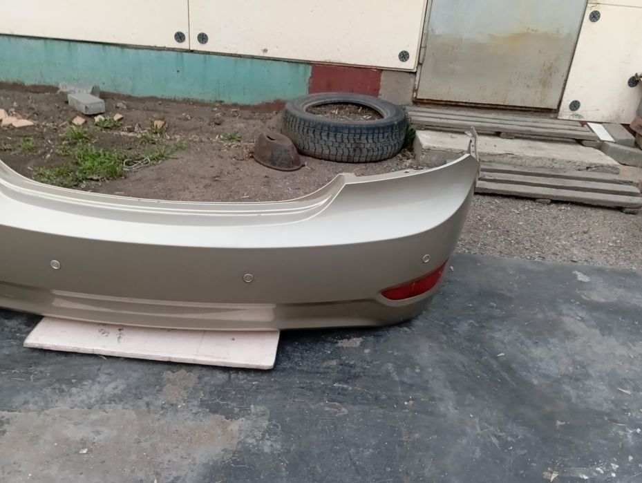 Бампер задний акцент 2011