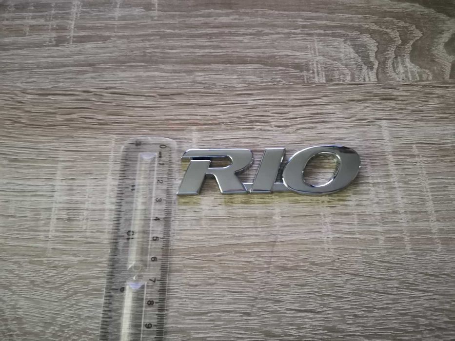 Емблема Надпис Kia Rio