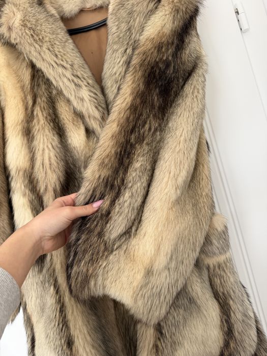 Haina din blana de vulpe