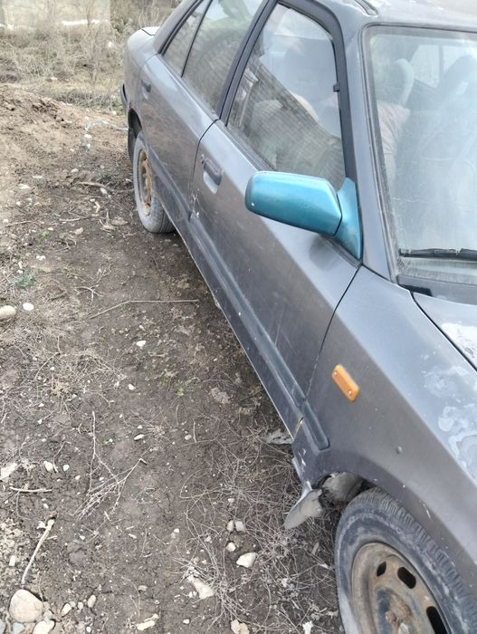 Машина Мазда 323