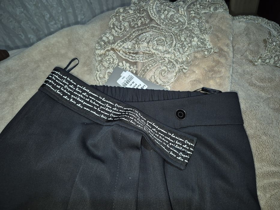 Продам брюки новые