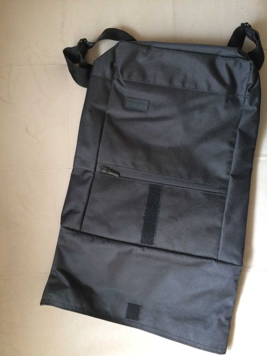 Чисто нова черна раница.