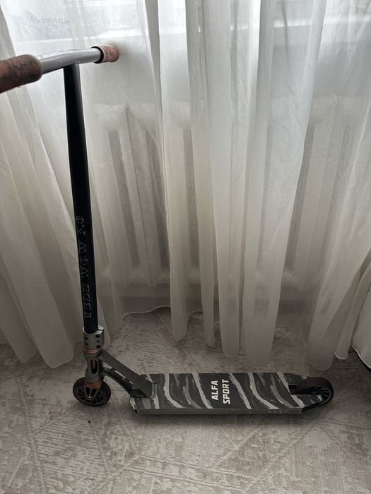 Трюковой самокат