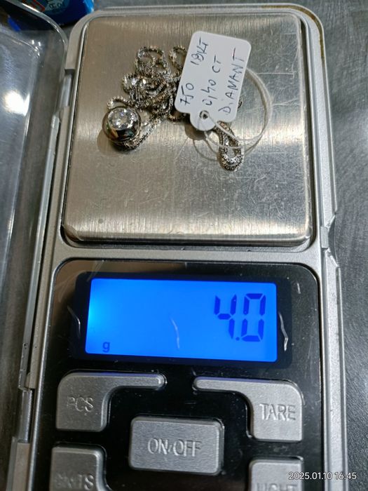 Vind pandantiv din aur 18k cu diamant 0,40ct