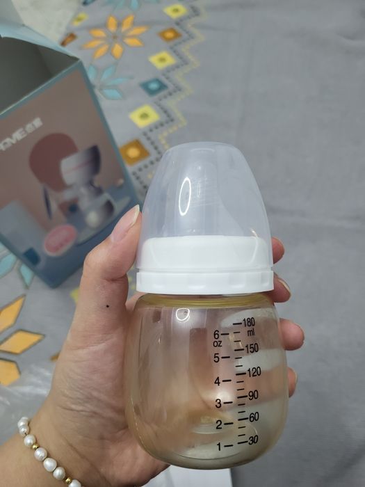 Молокоотсос электронный