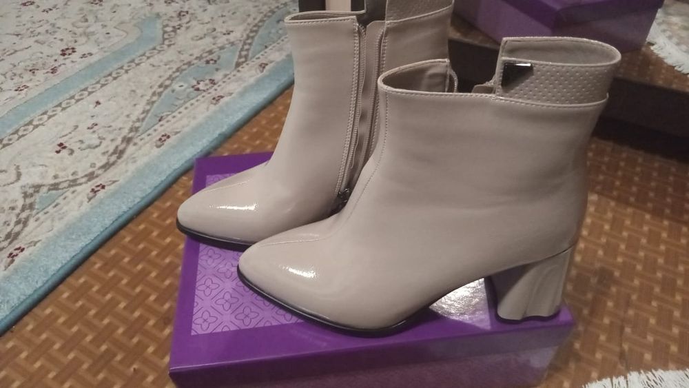 Кожаные сапоги в