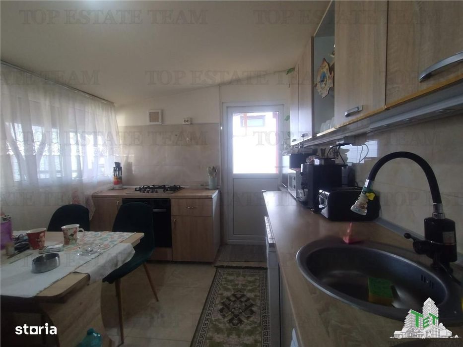 Teren generos 700 mp, include casa cu panouri fotovoltaice, langa Bucu