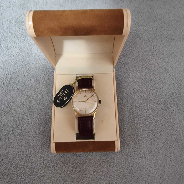 Vand ceas TELLUS in perfecta stare SWISS MADE,diam. fara cheita 34 mm.