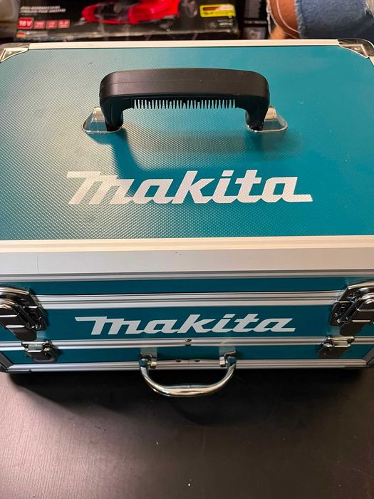 Mașină de găurit cu impact fără fir Makita DHP453RFX2 18 V / 3.0 Ah în carcasă de aluminiu + set de accesorii 96 piese, albastru/argintiu