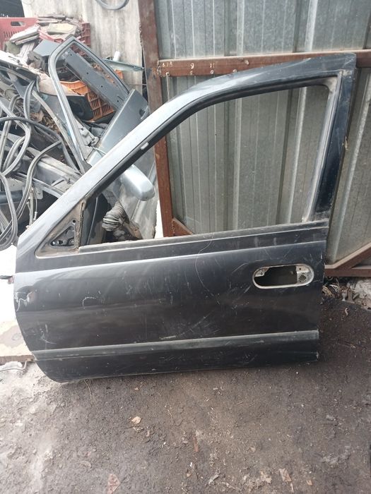 Дверь Нисан сани N14