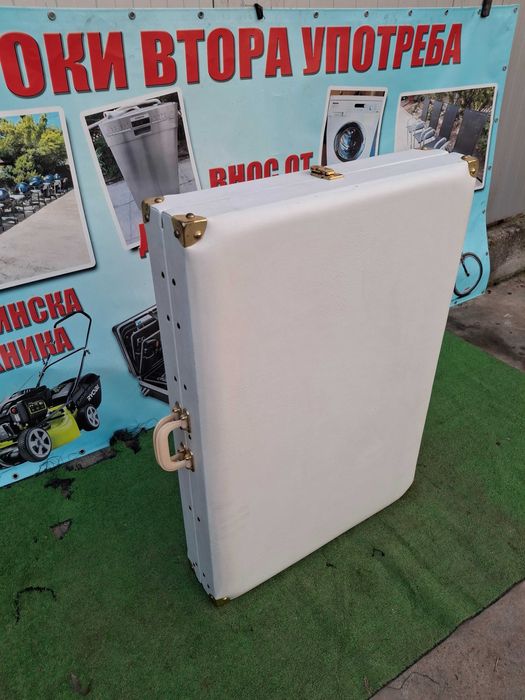 Масажна кушетка ..