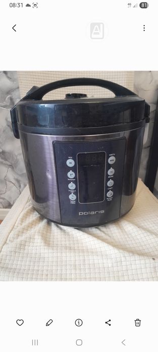 мультиварка черного цвета полярис