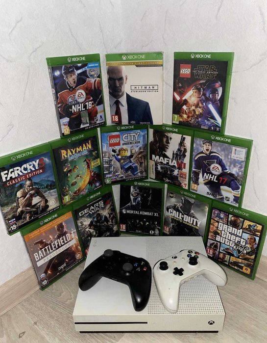 Приставка Xbox с дисками