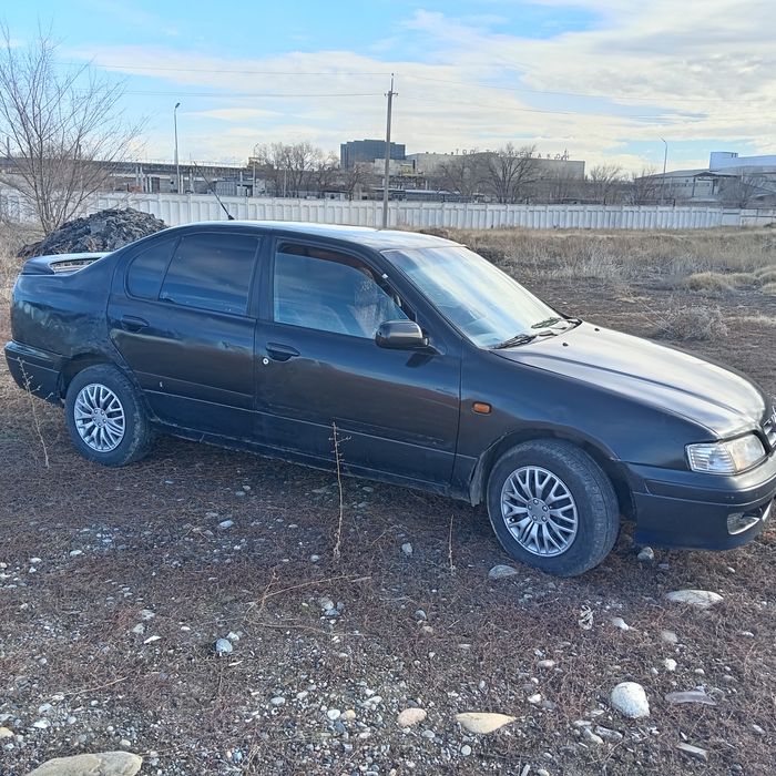 Ниссан примера р11