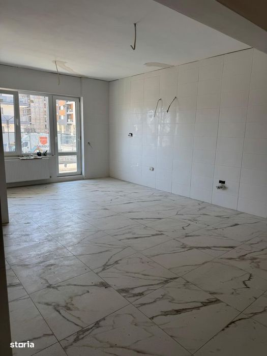 Aparatment 52 mp + Curte Proprie 55mp + Loc de parcare Subteran