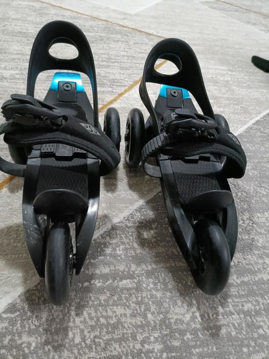 Роликовый коньки