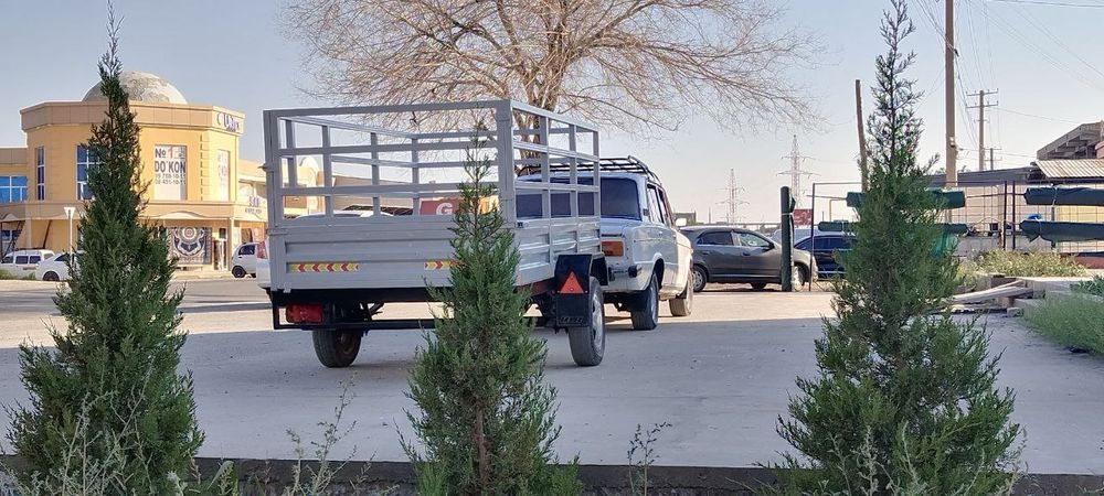 Автомабил сотилади зудлик билан прицепи бор охволи янги