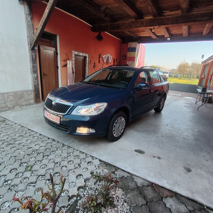 Skoda Octavia benzina 1 6 an2013 cu dotări perfecta stare ieftin GARAN