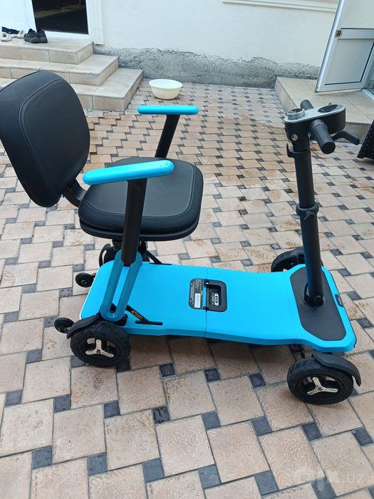 Oʻrindiqli 4 gʻildirakli elektr skuter