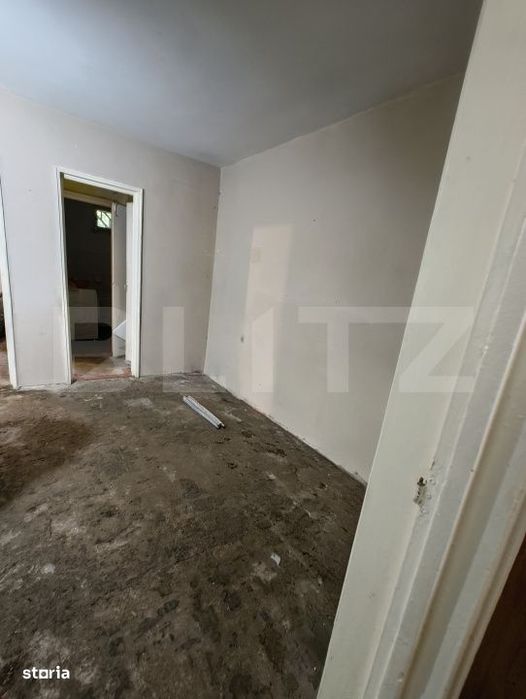 Apartament cu 2 camere la parter- nerenovat, 60 mp, zona Centru