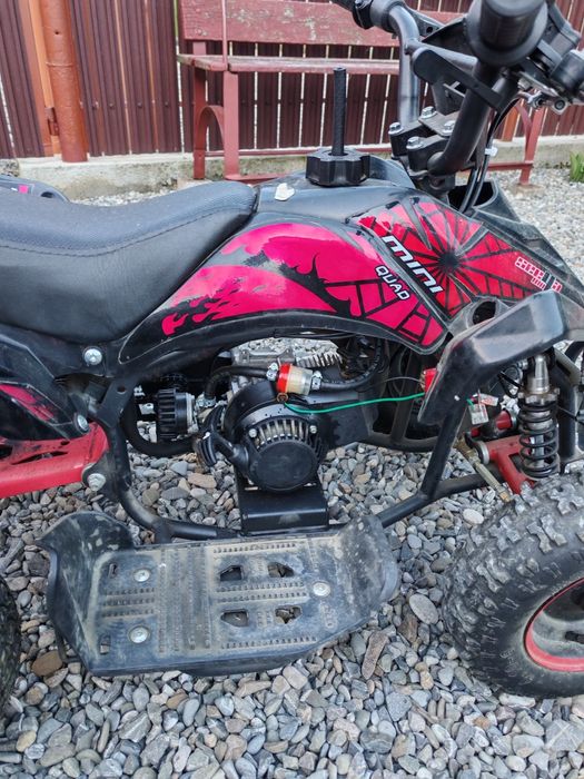 Atv-u 49cc pentru copii 7-12ani