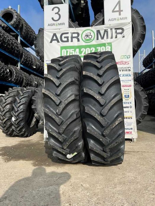 Cauciucuri noi 16.9-38 pentru tractor cu 14 pliuri marca OZKA