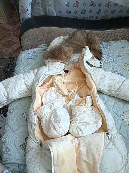 Продам детский комбинезон трансформер