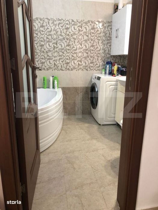 Apartament cu 2 camere, balcon inchis, parcare, expunere sudica, zona