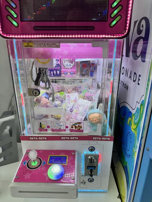 Игровой аппарат хватайка