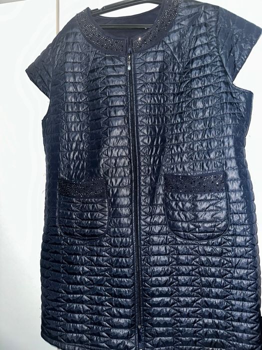 Продам желетку 56р