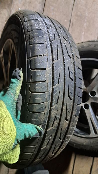 Продам три резины три титанки.  на 14 . 185/70