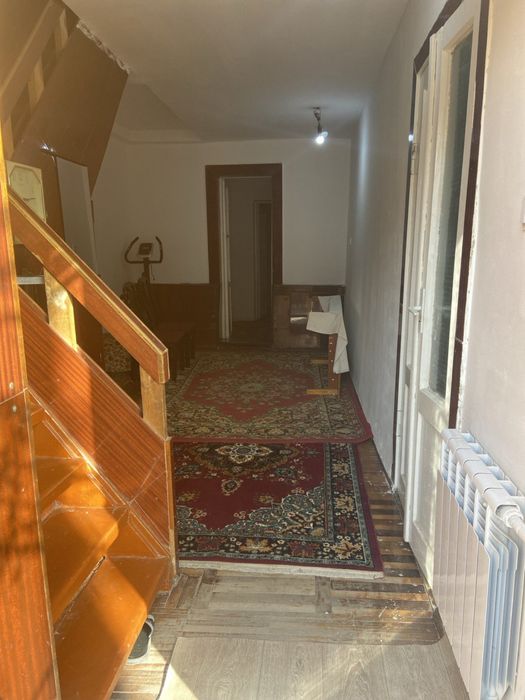 Двухэтажный дом с пристройкой