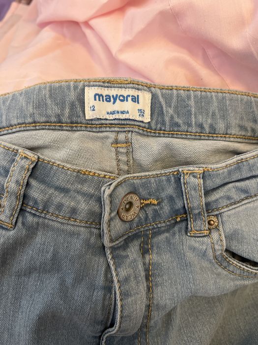 Джинсы фирменные на девочку 9-10 лет